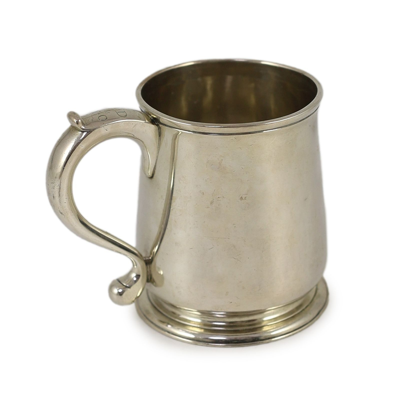 An early George II silver mug, London by Robert Lucas